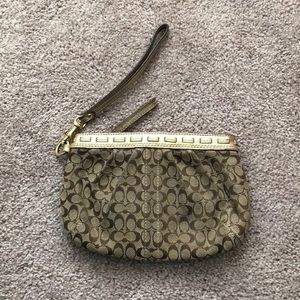 Coach gold  wristlet